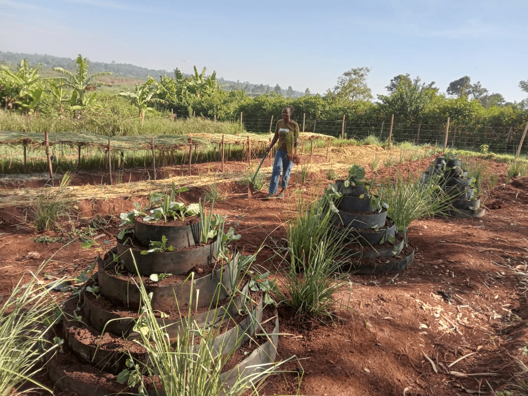 A group of people standing in front of a blackboard.